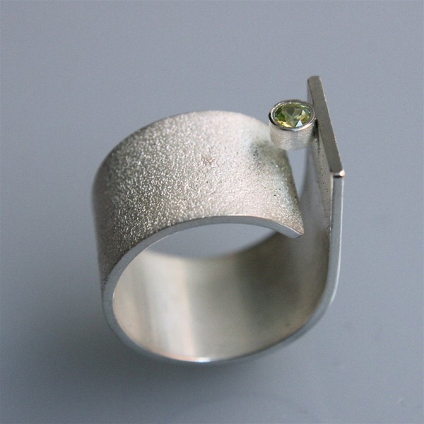 Contemporary minimalist ring " Q with periodot" in sterling silver