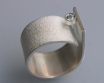 ring Q  handmade in sterling silver  with blue topaz ( 3mm)