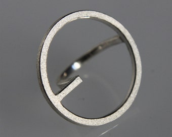 Contemporary handmade ring "OQ" in silver