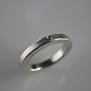 Handmade stacking ring in sterling silver with a 1.7 mm diamond