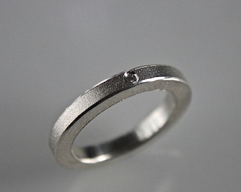 Handmade stacking ring in sterling silver with a 1.7 mm diamond