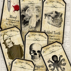 May include: Vintage style apothecary labels with black and white illustrations and text. The labels feature images of a skull, a ghost, a bunch of grapes, an octopus, and a set of teeth. The text on the labels includes "The Magic Apothecary", "Blood from a good year", "Ghost in a bottle", "Pickled Teeth", "Moldy Grapes", "Laggots", and "Octopus Ink".