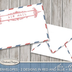 May include: Two white envelopes featuring a classic air mail border pattern with alternating red and blue slanted rectangles. One envelope displays a decorative red frame with the text AIR MAIL printed in the center, while the other is blank.