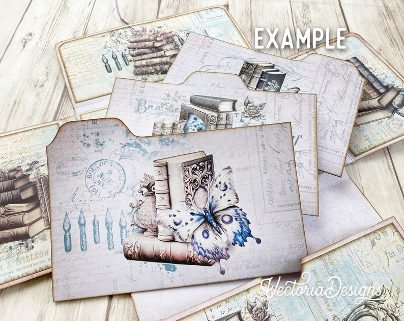 May include: A set of six vintage-style decorative paper folders in a blue and white colour scheme. The folders feature images of books, butterflies, and ink pens. The text "EXAMPLE" is printed on one of the folders.