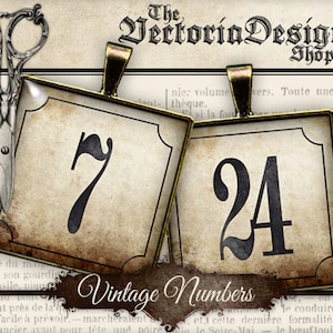 May include: Two vintage-style metal and glass number plaques with black numbers on a cream background. The numbers are 7 and 24. The plaques are attached to a gold-colored metal chain.