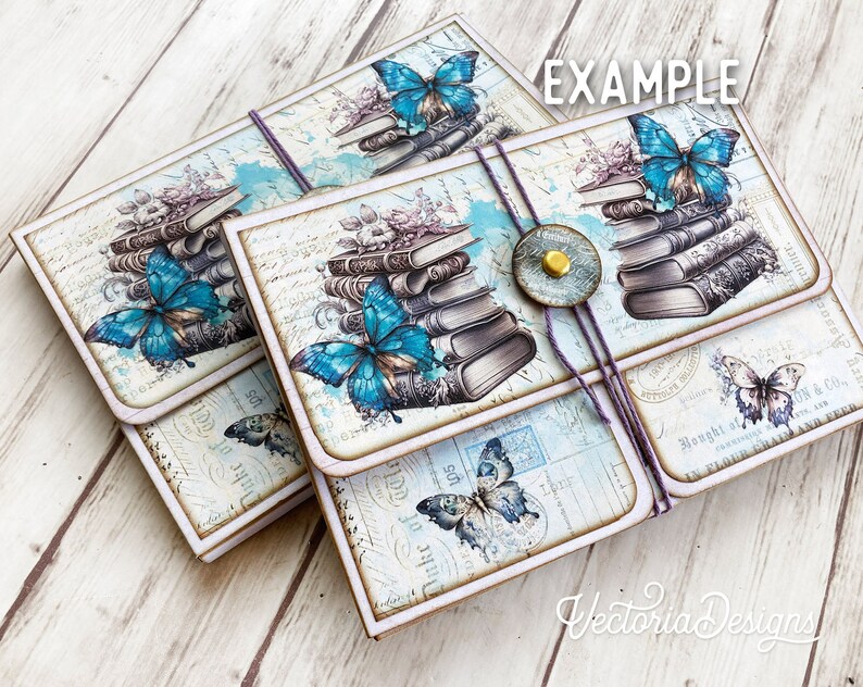 May include: Three decorative journals with a vintage aesthetic. Each journal features a stack of books, a butterfly, and a floral design. The journals are tied together with a purple ribbon and have the text "Duke of elle 105" printed on the front.