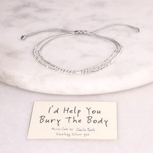 Armband i sterlingsilver med morsekod "Jag skulle hjälpa dig att begrava kroppen"