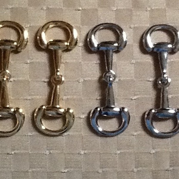 Two Gold Or Silver Snaffle Bits