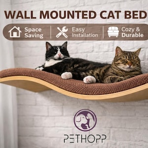 May include: Wall-mounted cat bed with two cats resting on it. The bed has a brown cushion and a wooden frame. The image includes text that says "Wall Mounted Cat Bed", "Space Saving", "Easy Installation", and "Cozy & Durable".