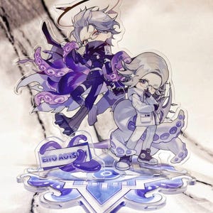 May include: An acrylic standee featuring two anime-style characters with light hair and glasses. One wears a dark outfit with purple octopus tentacles, the other a white jacket with tentacles. A sign reads EITO AOTSUKI on a blue geometric base.