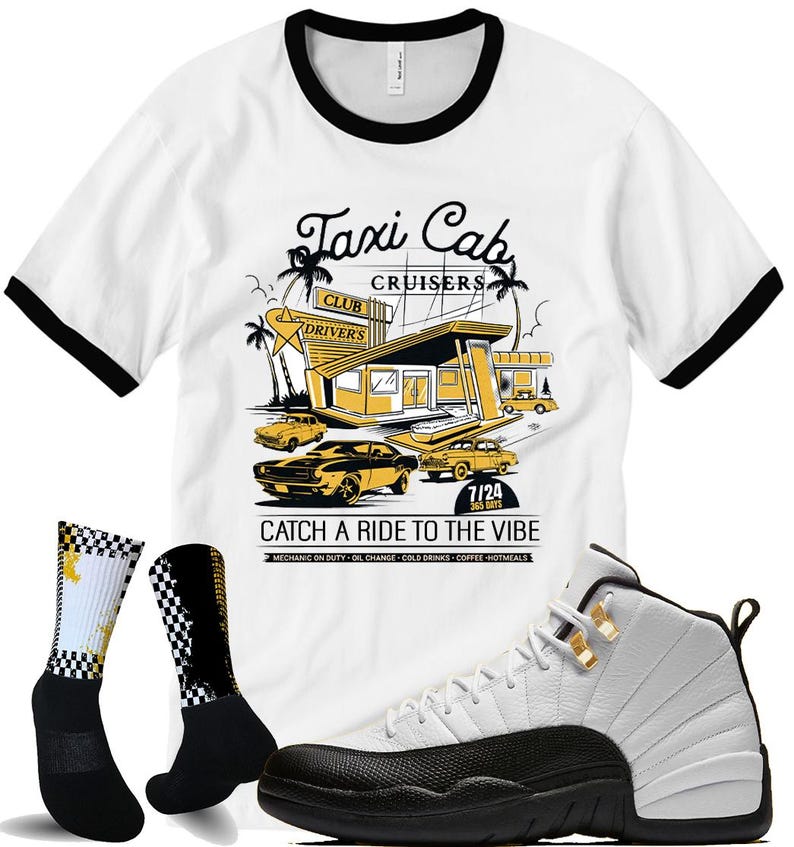 May include: A white t-shirt with black trim featuring a retro taxi cab design, paired with black and white checkered socks and a white and black basketball shoe. The shirt reads "Taxi Cab Cruisers" and "Catch a Ride to the Vibe".
