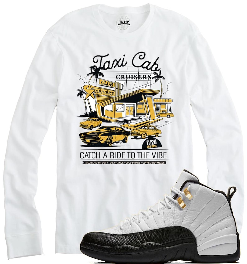 May include: White long-sleeve shirt with a yellow and black graphic of a taxi cab service, text reads "Taxi Cab Cruisers" and "Catch a Ride to the Vibe." A pair of white and black sneakers with gold accents are in the image.