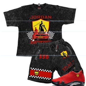May include: Black acid wash t-shirt and shorts set with a red and yellow graphic of Michael Jordan and a Ferrari. The shorts have the number "550" in red. Red and black sneakers complete the outfit.
