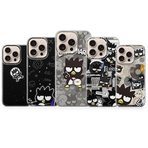 May include: A collection of phone cases featuring the Badtz-Maru character in various designs. The cases showcase a black, gray, and white color scheme with illustrations of the character, along with text like "GOOD" and "GOALS".