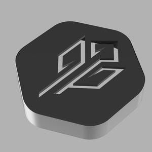 May include: A dark gray, rounded square emblem with a stylized arrow design. The arrow is white and angled, with a geometric shape. The emblem has a 3D effect, with a lighter gray edge, set against a light gray background.