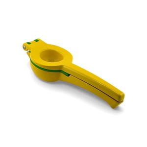 May include: A yellow citrus juicer with a green trim. The metal juicer has a handle for easy use. Designed for lemons and limes, it's a practical kitchen tool. The juicer is a kitchen tool.