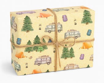 May include: A wrapped gift with camping-themed wrapping paper. The paper features illustrations of camper vans, tents, backpacks, lanterns, and pine trees on a light yellow background. The package is tied with twine.