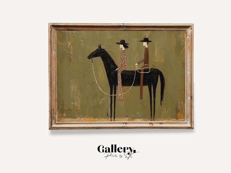 May include: Framed art print featuring a stylized depiction of two figures riding a black horse. The figures wear hats and are set against an olive green background. The artwork has a rustic, textured appearance, with the text "Gallery. Prints by SK" at the bottom.