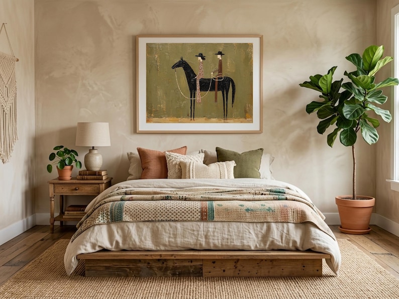 May include: A bedroom scene featuring a bed with a patterned quilt, pillows, and a wooden frame. A framed artwork depicting a horse and rider hangs above the bed. A potted plant and a lamp are on a wooden nightstand. The room has a neutral color palette.