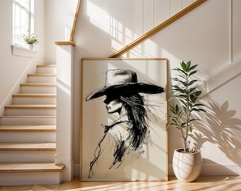 Op de afbeelding: Een zwart-wit schets in een lijst van een persoon met een breedgerande hoed. Het kunstwerk wordt tentoongesteld in een lichtgekleurde kamer met een trap en een potplant. Het kunstwerk heeft een neutraal kleurenpalet.