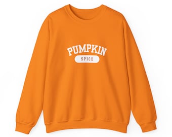May include: An orange crewneck sweatshirt with the words "PUMPKIN SPICE" printed in white across the chest. The text is in a collegiate-style font, with "SPICE" on a white rectangular background.