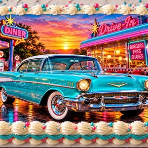 May include: A rectangular sheet cake featuring an edible print of a turquoise classic car parked in front of a retro diner at sunset. The image includes neon signs reading Diner, Drive-In, and Burgers Fries Shakes. The cake has white frosting borders.