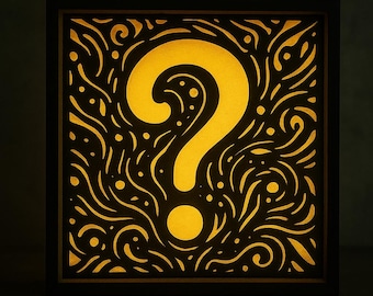May include: A square, illuminated wall art piece featuring a large yellow question mark. The background is black with an intricate pattern of swirling lines and dots. The frame is dark brown.