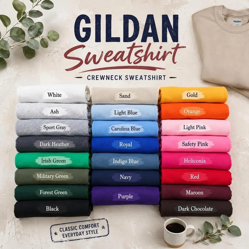 May include: A Gildan crewneck sweatshirt color chart featuring thirty folded sweatshirts in various shades including white, ash, sport gray, dark heather, green, blue, yellow, orange, pink, red, purple, maroon, and dark chocolate with text.