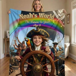 May include: A vibrant blanket depicting a pirate ship scene with a child at the helm. The blanket displays the text "Noah's World" and "The Future Is Yours Age 8" with a rainbow design. A parrot is perched on the child's shoulder.
