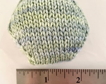 Hand knitted Hexipuffs