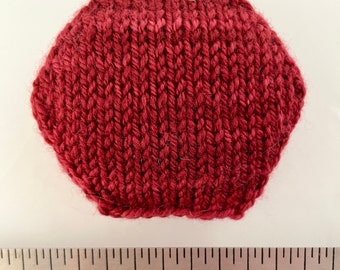 Hand knitted Hexipuffs