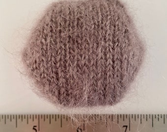 Hand knitted Hexipuffs