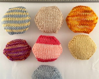Hand knitted Hexipuffs