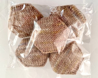 Hand knitted Hexipuffs