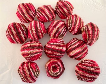 Hand knitted Hexipuffs