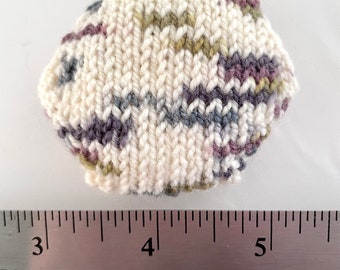 Hand knitted Hexipuffs