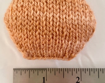 Hand knitted Hexipuffs