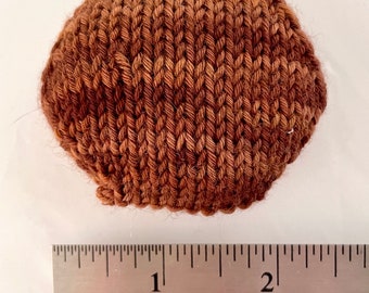 Hand knitted Hexipuffs