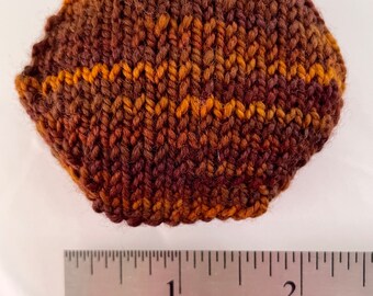 Hand knitted Hexipuffs