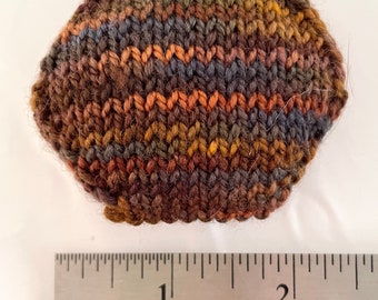 Hand knitted Hexipuffs
