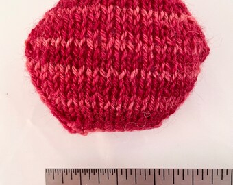 Hand knitted Hexipuffs