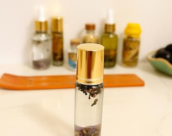 Roll-on de aceite para un sueño profundo: infusionado con lavanda, manzanilla, vainilla y amatista.