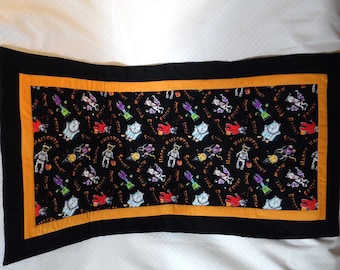 Halloween Trick or Treaters Quilted Table-runner with a black and Orange