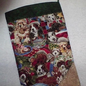 May include: A Christmas stocking with a green cuff and a festive dog-themed pattern. The fabric features various dog breeds in holiday attire, surrounded by Christmas decorations. The stocking is designed for holiday decor.