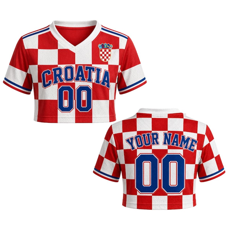 May include: A red and white checkered crop top with the word "CROATIA" in blue letters and the number "00". The top has a V-neck and a Croatian coat of arms. The back of the top says "YOUR NAME" and has the number "00".
