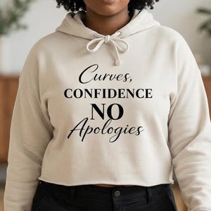 May include: A trio of ceramic mugs with a speckled, matte finish in cream, light grey, and dark grey. Each mug features a simple, minimalist design, ideal for tea or coffee.