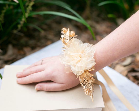 Golden Flower Corsage | Prom or Wedding Corsage | Mother of the Bride Corsage Wristlet with Golden Shimmery Bloom & Gold Artificial Greenery