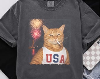 Comfort Colors® 4th of July Orange Cat Shirt, Funny USA Cat Graphic Tee, Patriotic Fireworks T-Shirt, Retro Independence Day Cat Lover Gift