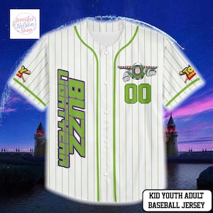 A white baseball jersey with green and yellow stripes, featuring a character from the Toy Story franchise.
