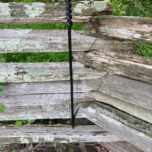 Hand forged fireplace poker, barbed end